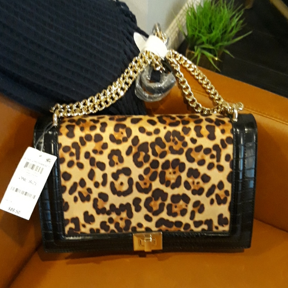 Faux leather and leopard pattern handbag
